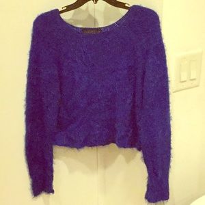 Deep ocean blue fuzzy sweater.